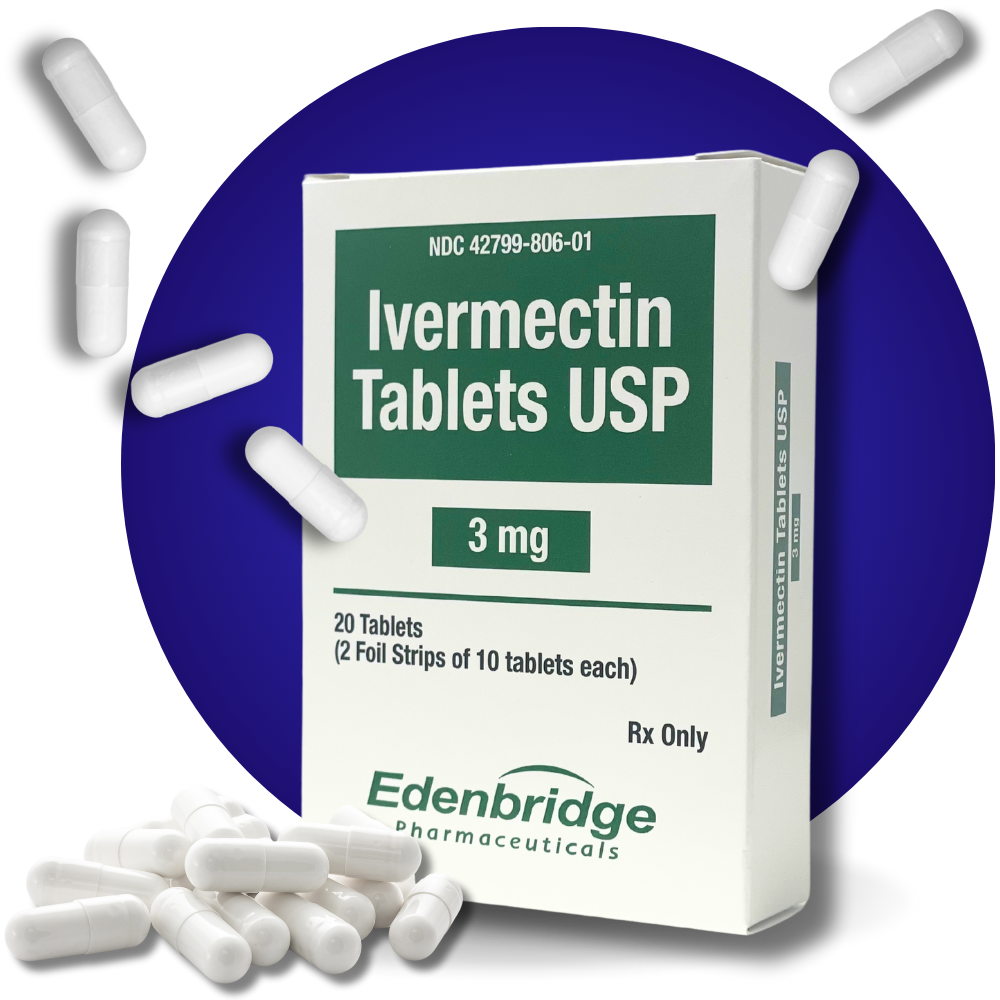 A tablet of ivermectin tablets is falling into the air.